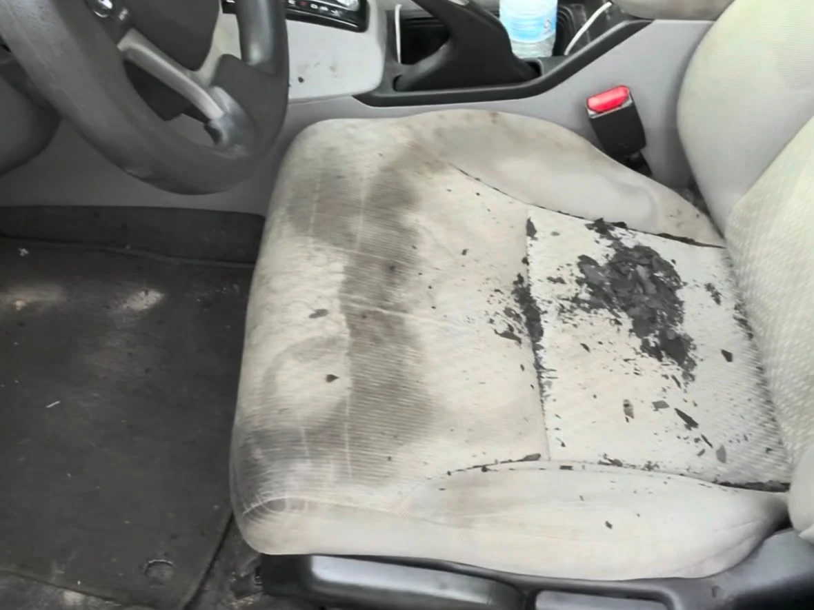 Heavily soiled Honda driver seat before Rod Shine detailing